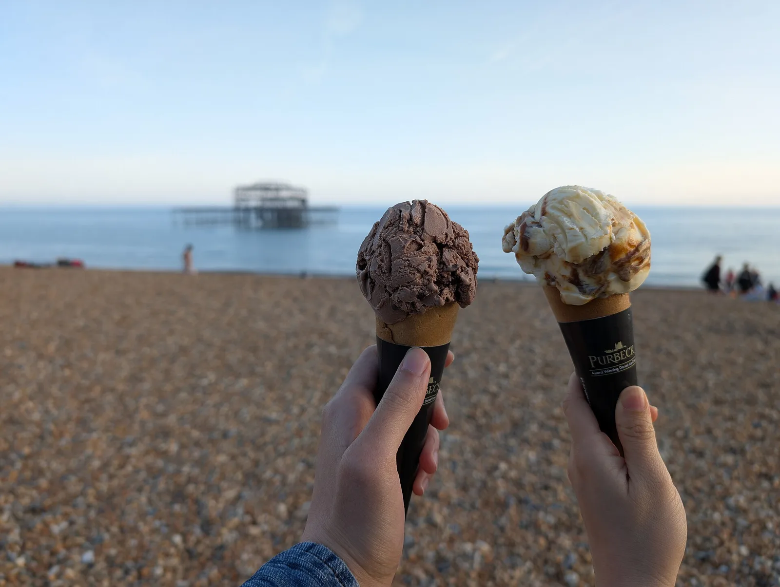 Two ice cream cones, chocolate and banoffee ripple, bought at a beach hut in Brighton, England.