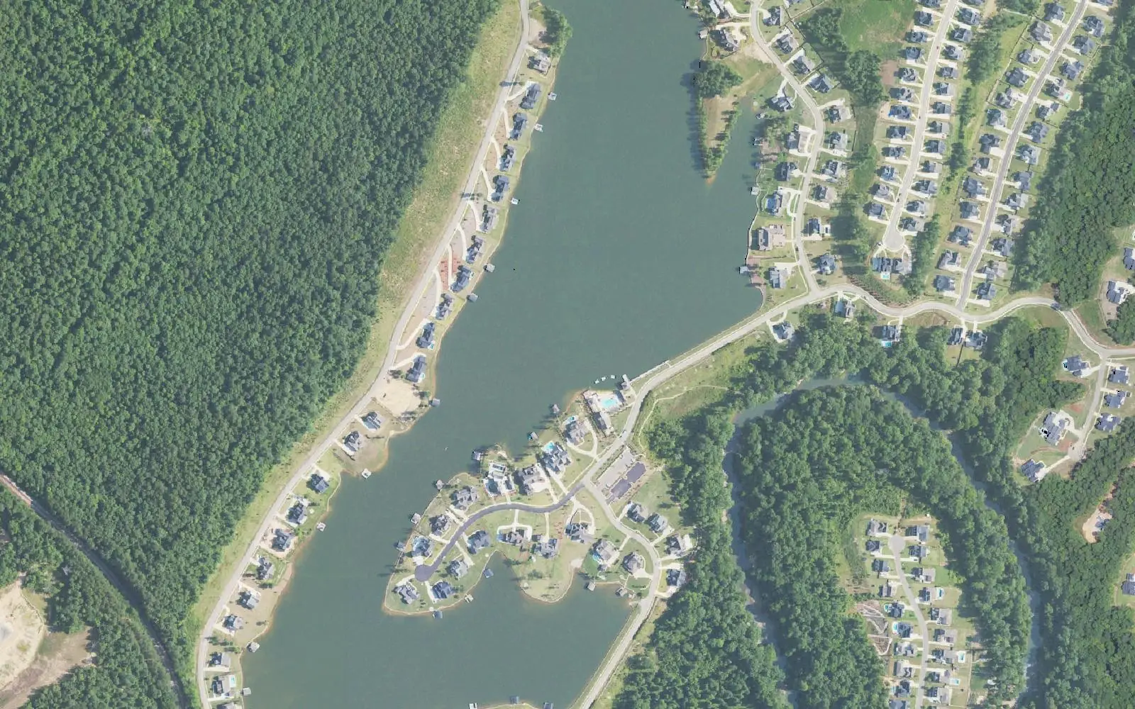 Aerial view of Blackridge Lake in southwest Hoover, with homes along its shores.