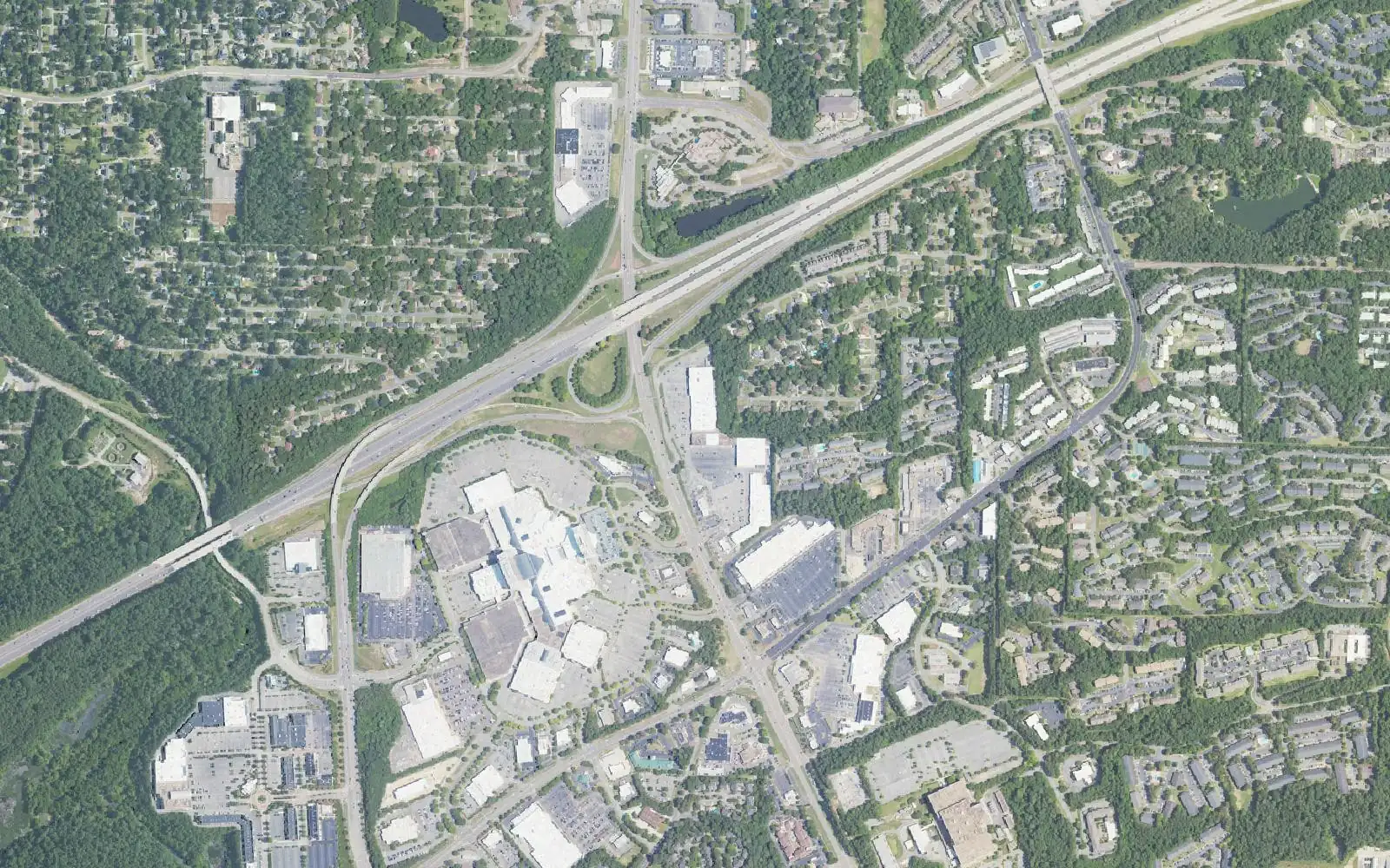 Aerial view of central Hoover: the Riverchase Galleria at lower left, I-459 and U.S. 31, with homes and apartments on either side.