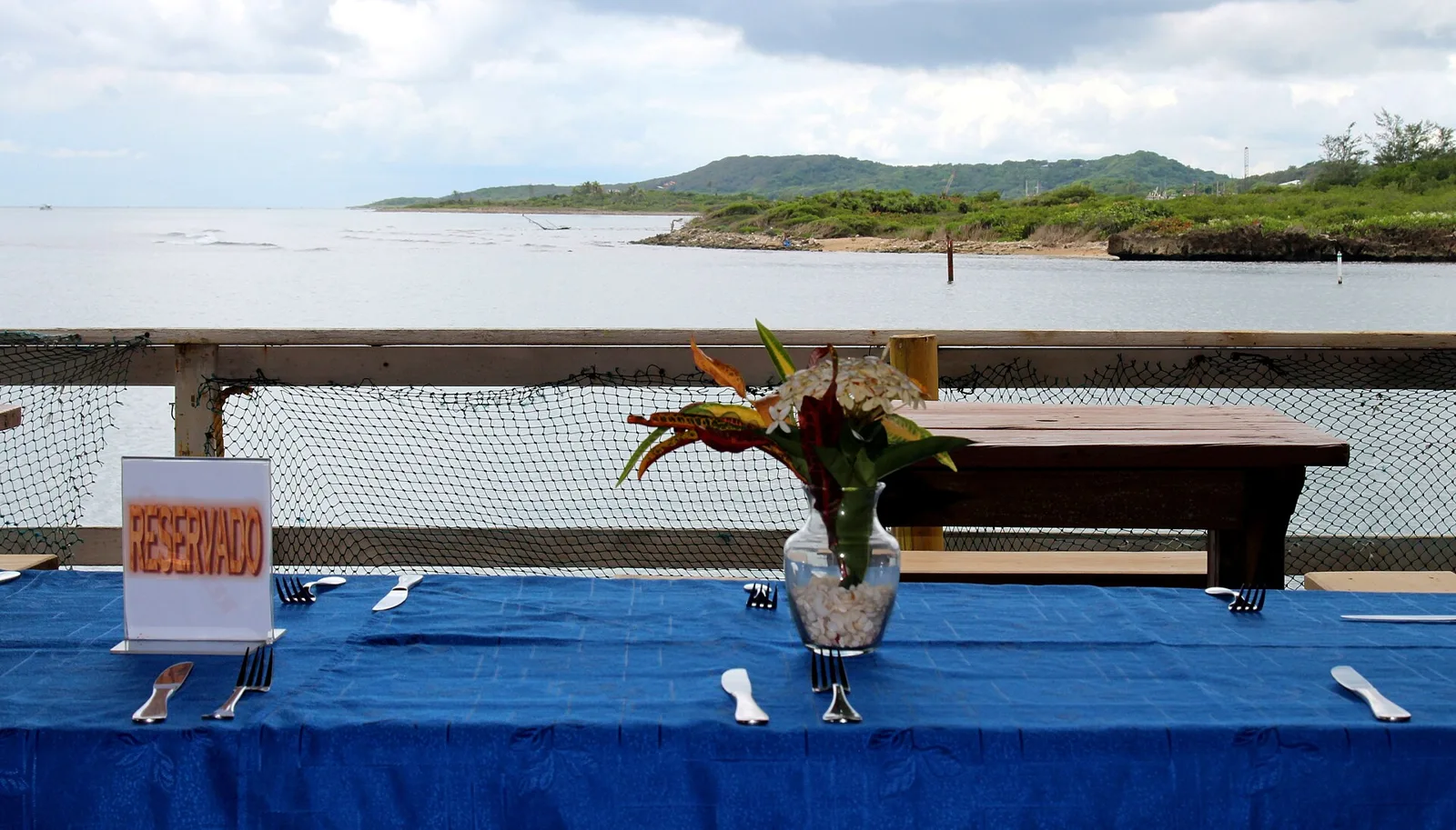 Patio tables at a restaurant in French Harbour, Roatan, Honduras.