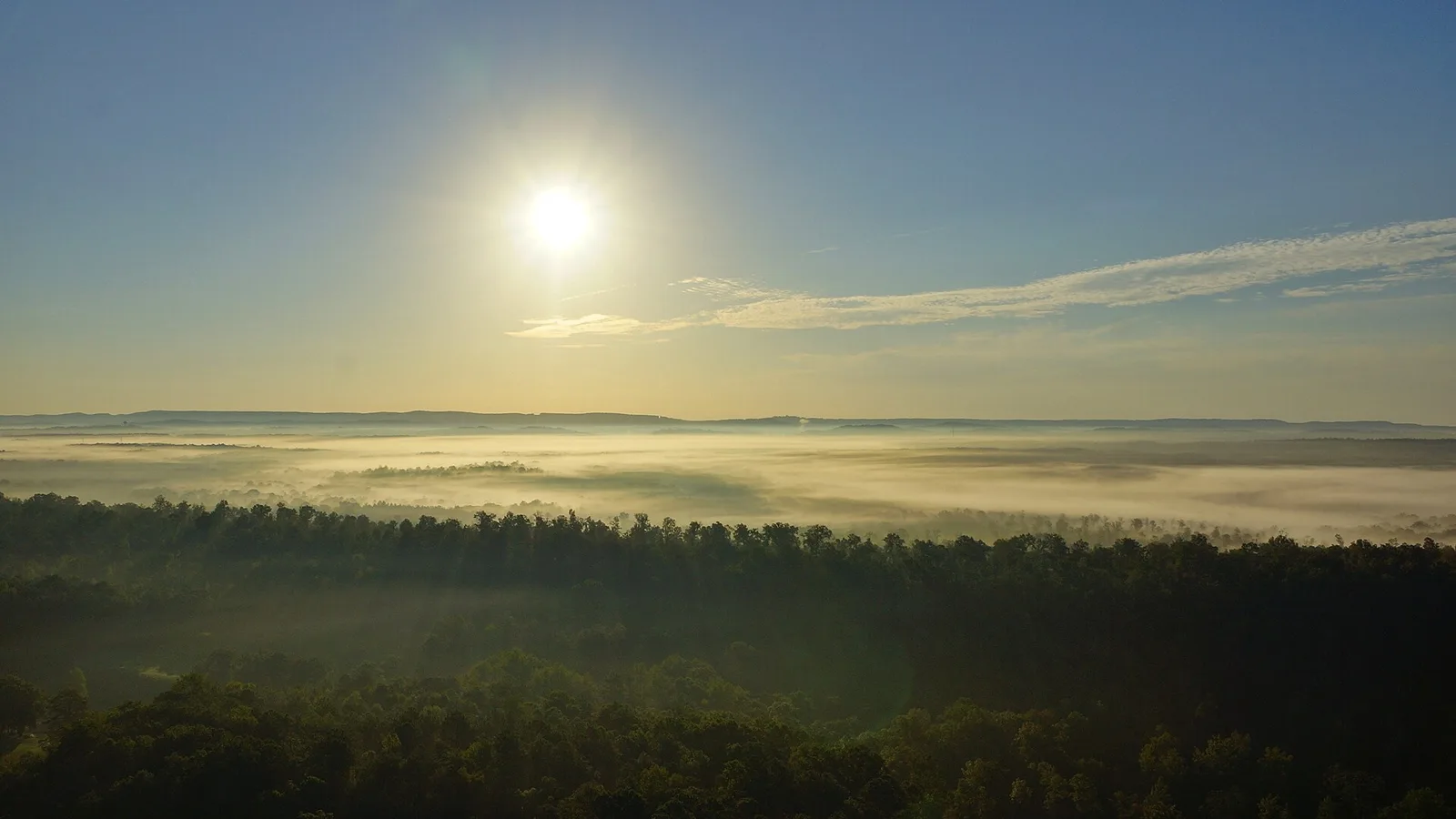 Morning fog fills the valley below Shades Mountain, seen from South Shades Crest on Hoover's southwest side.